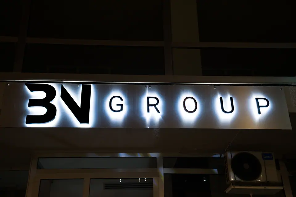 3V Group side-lit exterior signage at night
