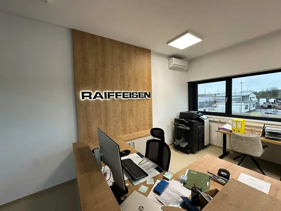 Raiffeisen timber-panel sign in an office